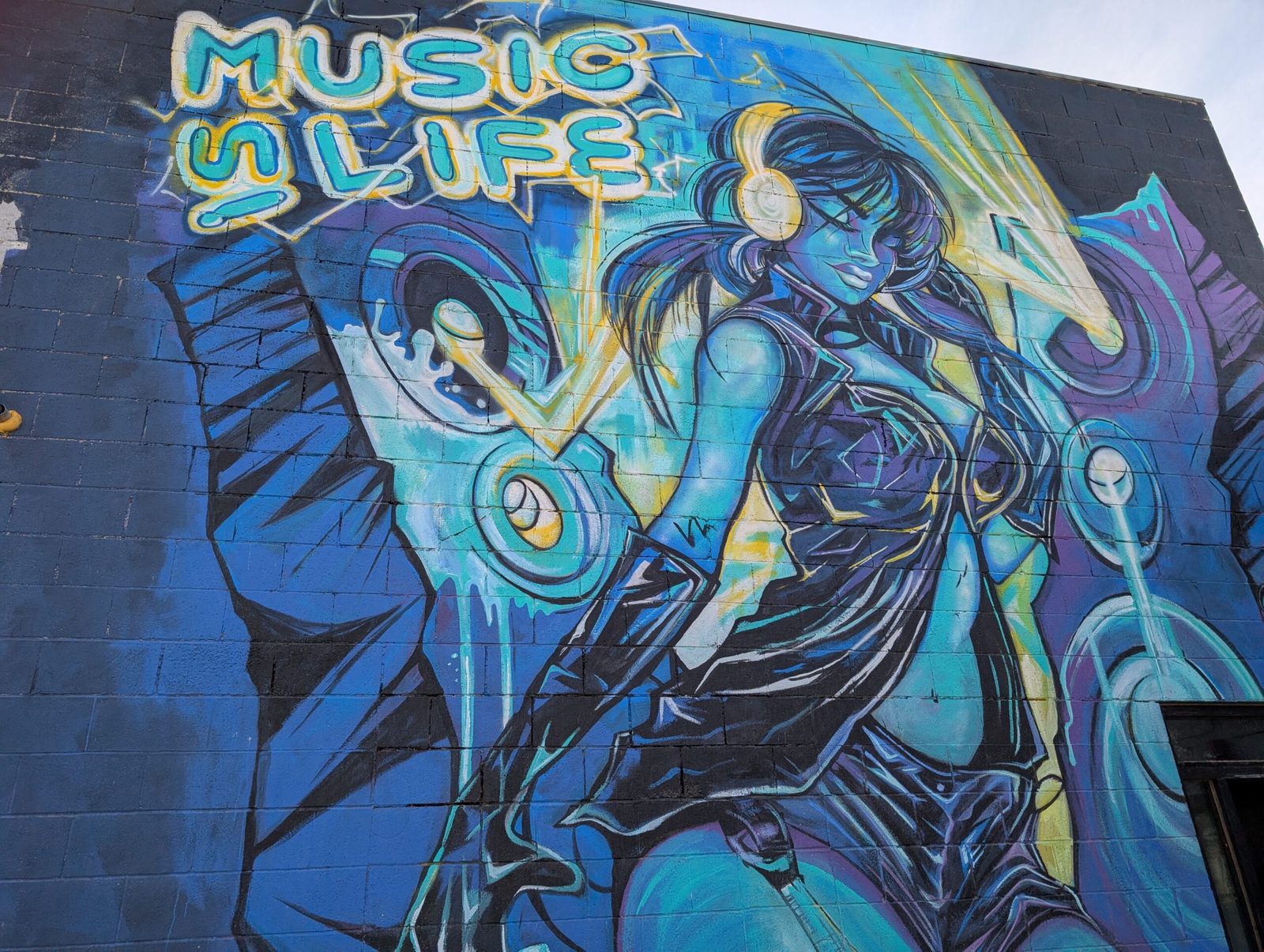 A vivid music-themed mural on a building in the Las Vegas Arts District