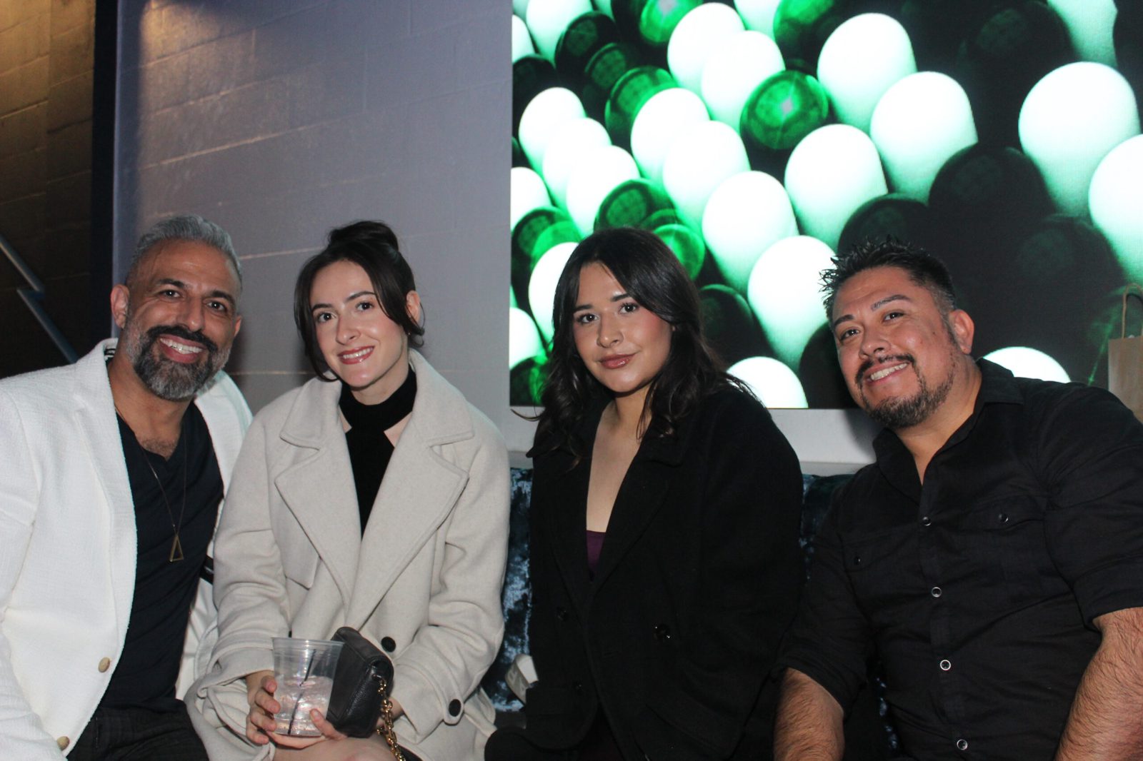 Guests celebrating a night out at Audio Bar